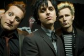 Green Day In Suits Staring at Camera