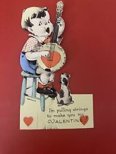 Vtg Valentine die-cut, boy playing banjo with his puppy, fold out card, c. 1938 picture