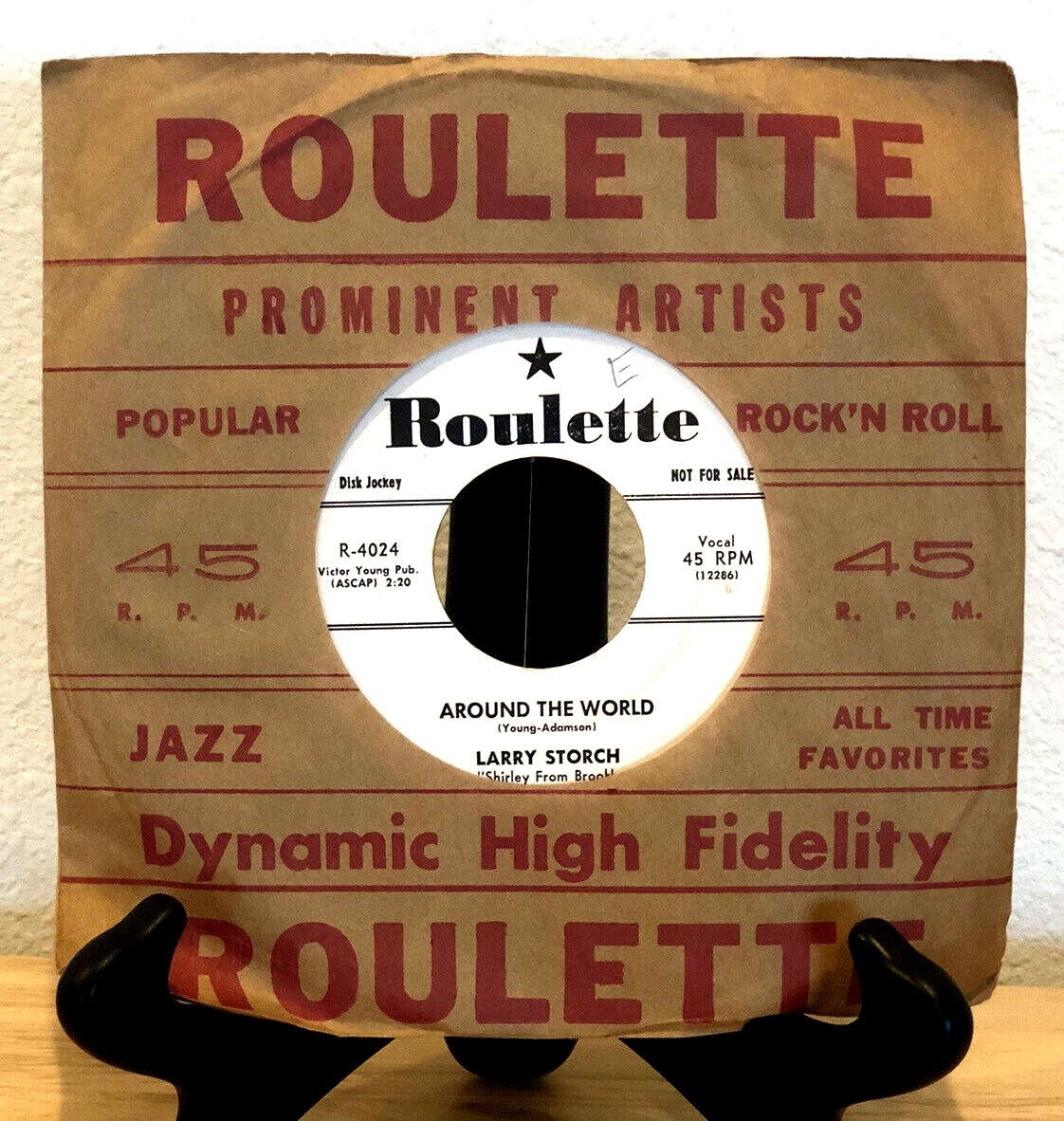 VINTAGE 1957 ROULETTE PROMO LARRY STORCH AROUND THE WORLD 45 RPM RECORD