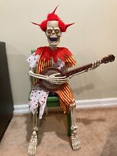 Halloween Express Skeleton Clown Playing Banjo Animated Halloween Prop picture