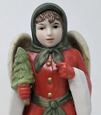 Vintage Christmas figurine music box in good condition with traditional tune picture