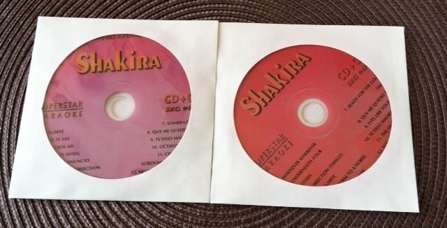 2 CDG SHAKIRA KARAOKE DISCS GREATEST HITS SUPERSTAR SPANISH SUERTE CD+G LOT 