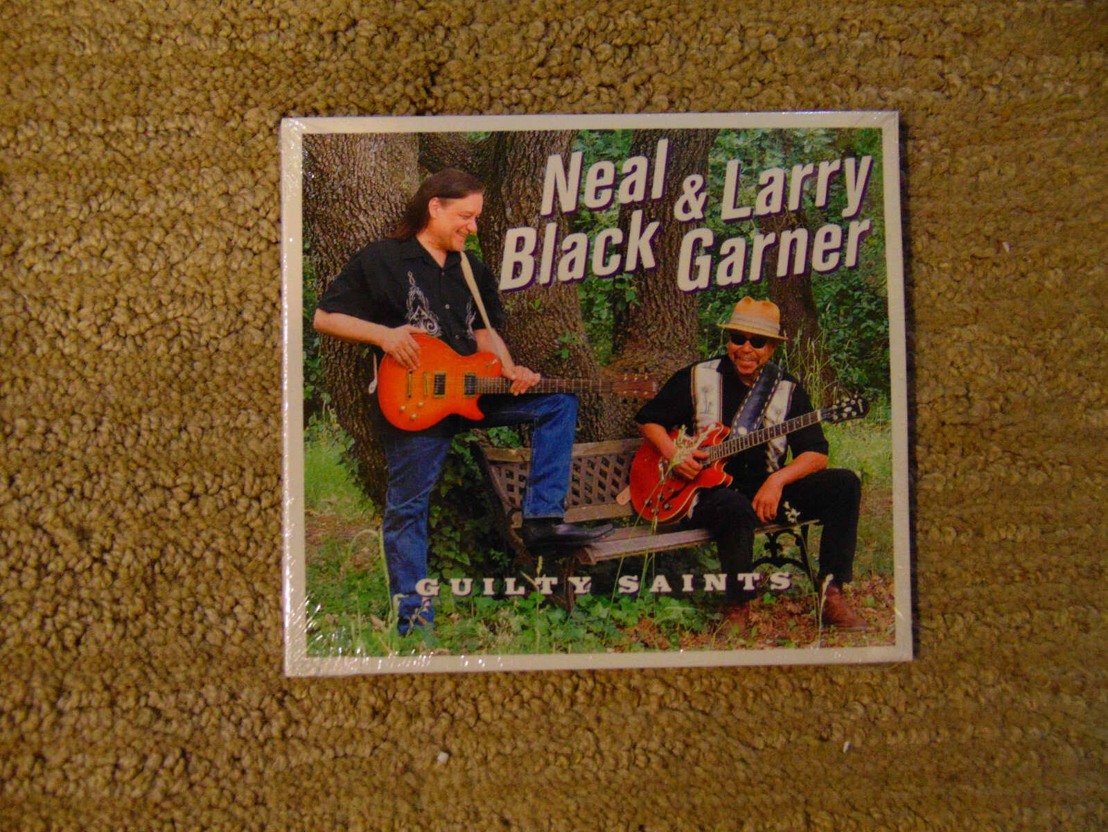 Neal Black & Larry Garner  Guilty Saints