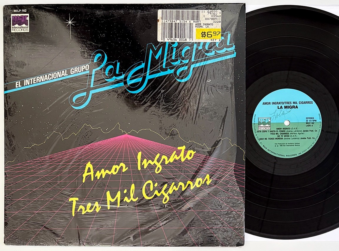GRUPO LA MIGRA Amor Ingrato, Tres Mil Cigarros 1985 LP, Nice in Shrink, VG+/VG+