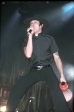 Singer Scott Weiland is shown at a live concert appearance with th- Old Photo picture