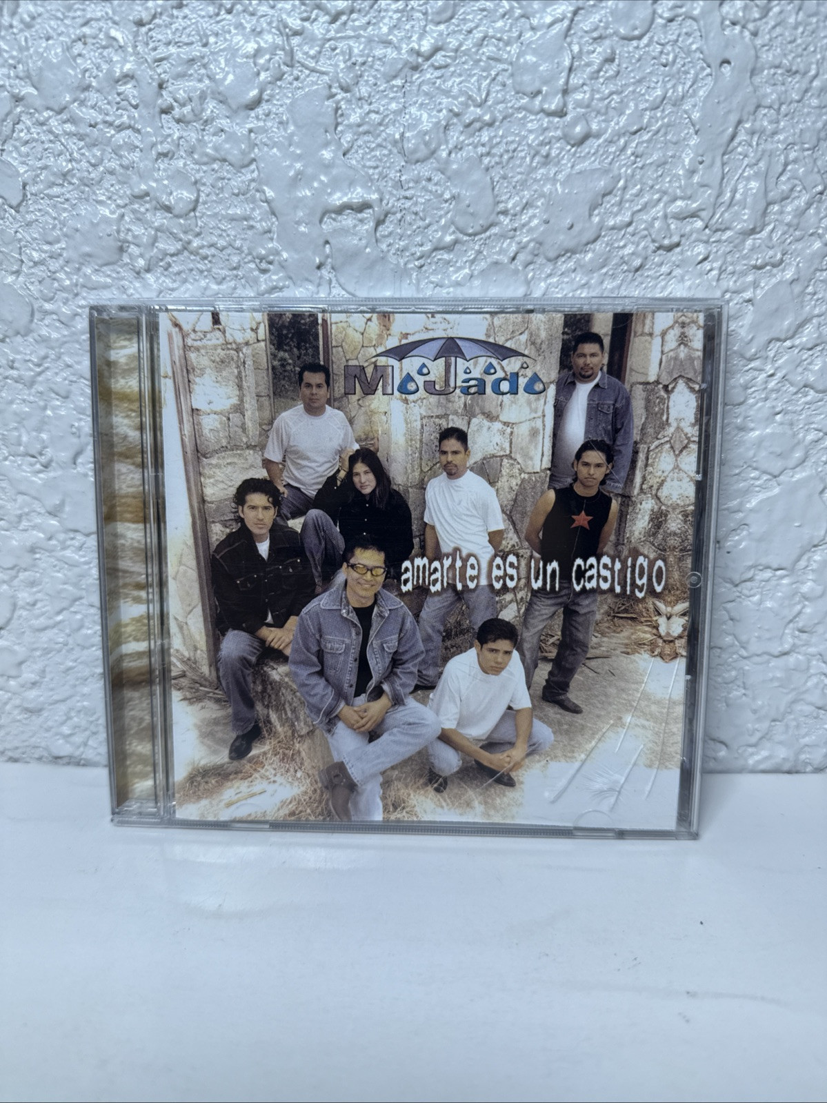 GRUPO MOJADO Amarte Es Un Castigo CD