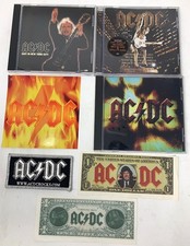 AC/DC Promo Lot - 3 Promo CDs/4 Angus Bucks/Bonfire sticker/Iron-on patch picture