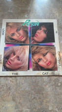 Poison	Look What the Cat Dragged In 1986 Enigma ST-12523	Vinyl LP	FREE SHIPPING picture